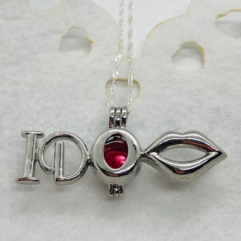 “I Do “Pearl Cage Charm sterling Necklace 
.